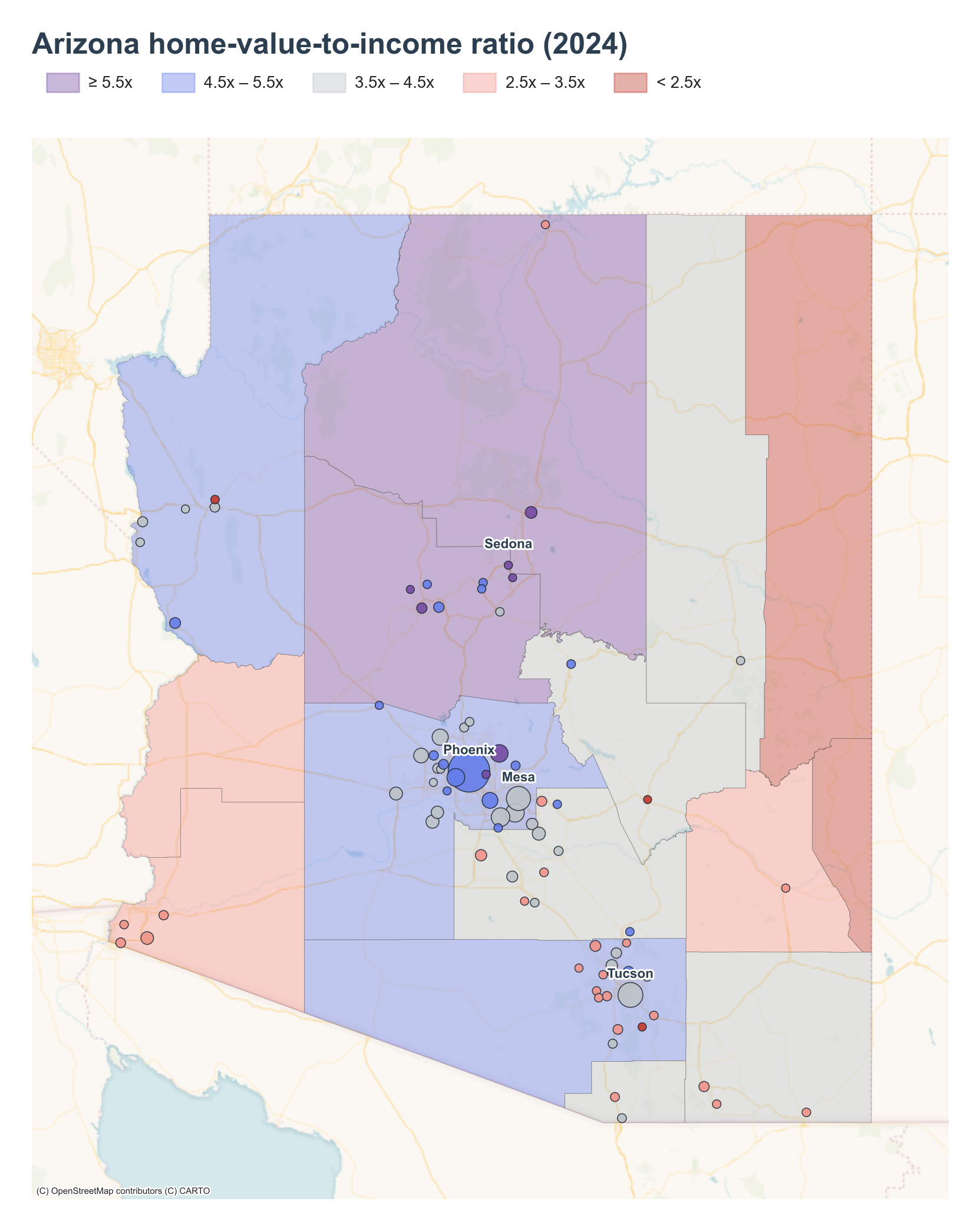 Arizona counties shaded by 2024 home-value-to-income ratio with place markers