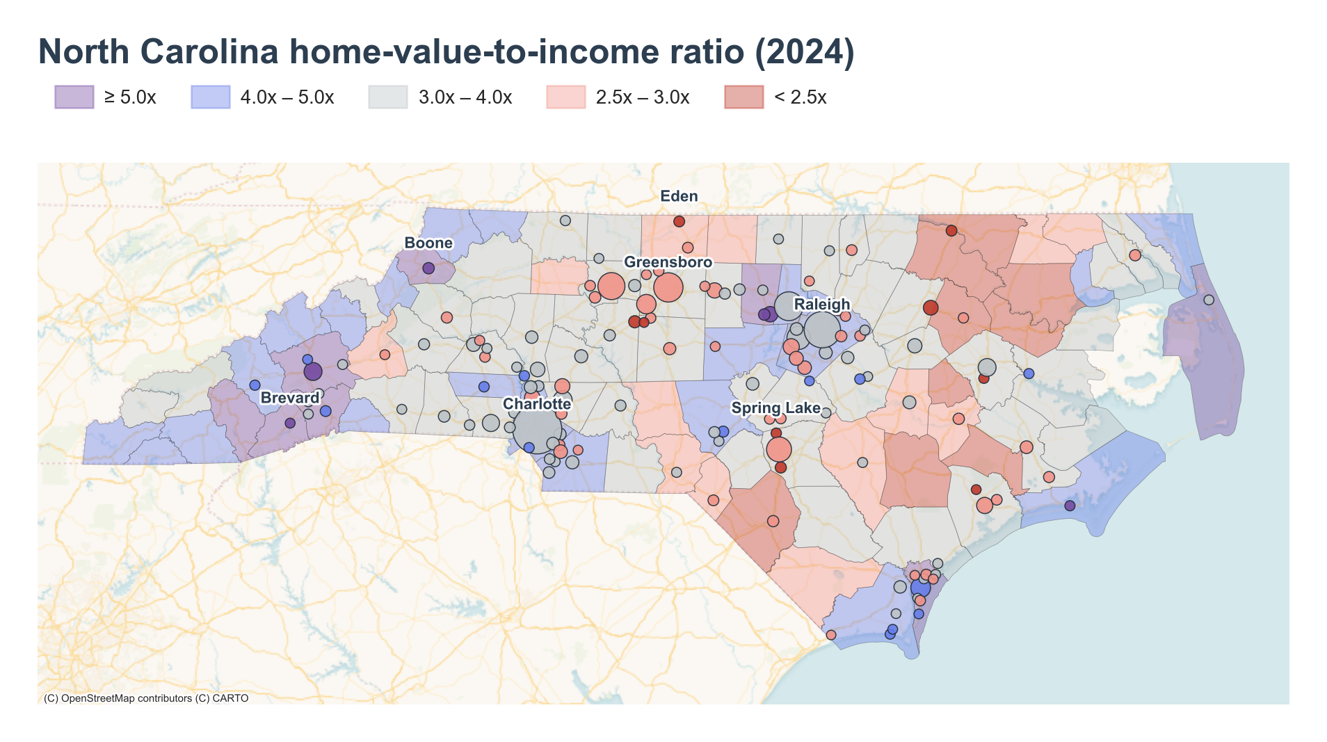 North Carolina counties shaded by 2024 home-value-to-income ratio with place markers overlaid