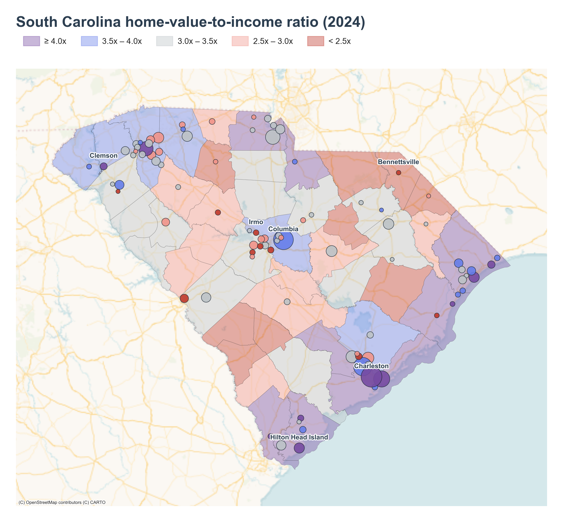 South Carolina counties shaded by 2024 home-value-to-income ratio with place markers overlaid